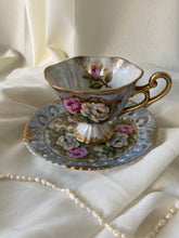 Load image into Gallery viewer, Vintage Sterling Iridescent Teacup and Saucer with Textured Pansy Flowers
